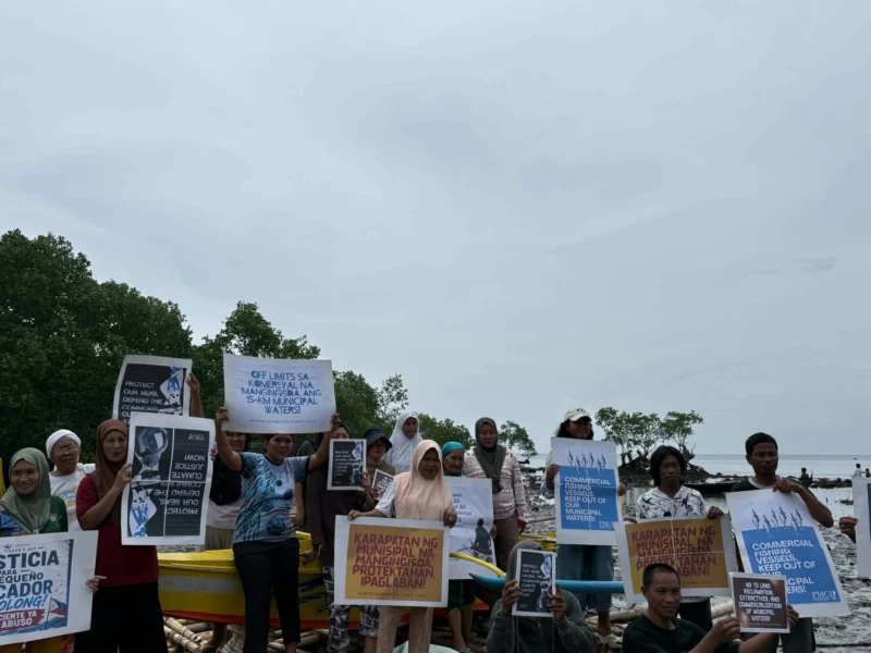 A fluvial parade and community forum held by local fisherfolk and youth advocates along the coast of Zamboanga City to protest commercial fishing vessel encroachment.