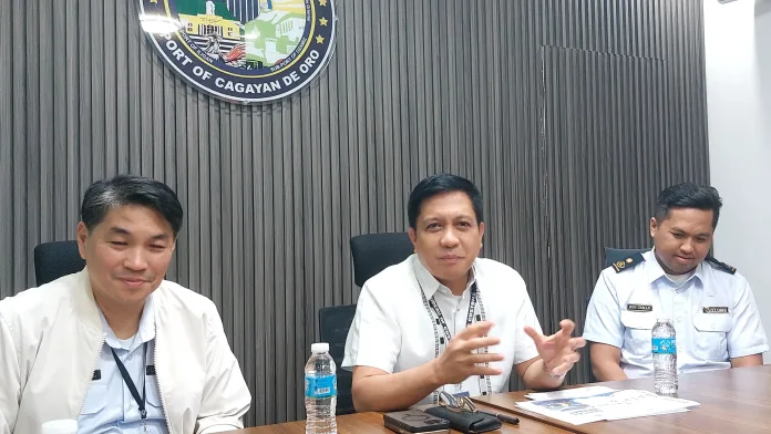 Bureau of Customs District 10 District Collector Arnaldo M. Saulong, center, confers with local journalists and officials from the Cagayan de Oro Press Club during a stakeholder meeting on Tuesday, July 28, 2026. Custom officials emphasized the vital role of local press partnerships in keeping the public informed on customs enforcement and trade compliance across the region. (Photo by Edwin Iyo)