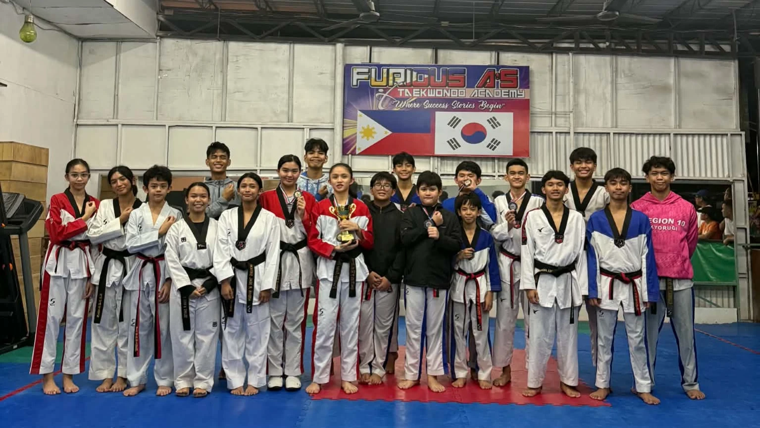 Members of the Cagayan de Oro taekwondo delegation at their home gym, Furious A's Academy ahead of the Smart MVP Sports Foundation National Taekwondo Championship in Manila. The city's strong showing reinforces the city's growing reputation as a grass-roots sports hub capable of developing top-tier youth martial artists for national competition. Photo Courtesy of Ben Ree "JB" Toledo/Furious A's Academy coach