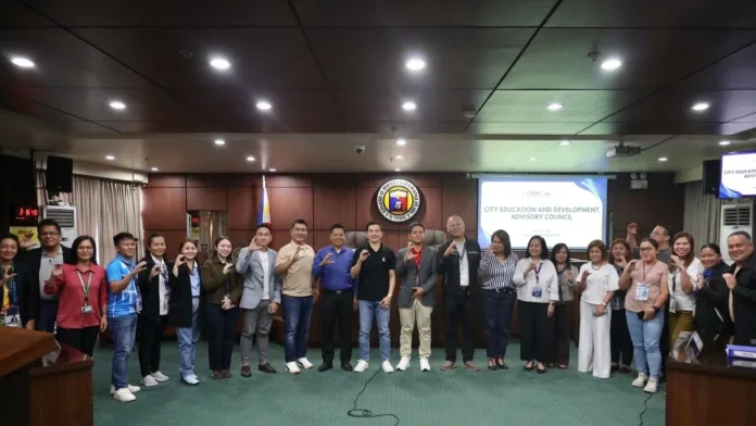 EDUCATION REFORMS. Members of the City Education and Development Advisory Council (CEDAC) gather at the Cagayan de Oro City Council Session Hall on July 28 after endorsing key education initiatives, including proposed barangay reading centers, a special needs intervention center for children, expanded technical skills training, and learning recovery programs aimed at improving educational outcomes for Kagay-anon learners. (Photo courtesy of Cagayan de Oro City Information Office)