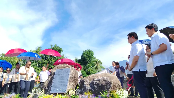 Officials including DOST Secretary Renato U. Solidum Jr. and Camiguin Gov. Xavier Jesus Romualdo reveal a historical marker commemorating the 1951 eruption of Mt. Hibok-Hibok during the opening of Regional Science, Technology and Innovation Week in Mambajao, Camiguin, on July 22, 2026. The unveiling highlighted how scientific advancements and volcano monitoring have strengthened community resilience since the tragedy. (Photo by Shiela Mae Butlig)
