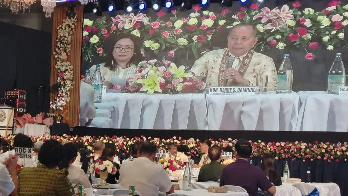 Regional Development Council Region 10 Chairperson Governor Henry Oaminal leads a panel discussion at the 145th RDC Full Council Meeting in Cagayan de Oro City.