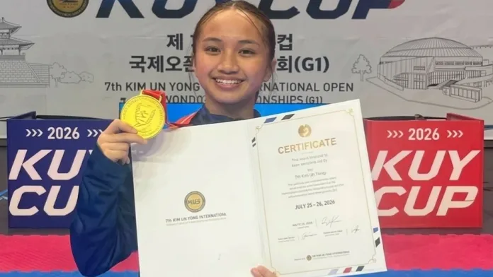 National Academy of Sports student-athlete Ma. Jezrah Lyana Velo Timpangco displays her gold medal at the 7th Kim Un Yong Cup International Open Taekwondo Championship at Jangchung Arena in Seoul, South Korea. Timpangco's success highlights the impact of state-backed athletic programs like the National Academy of Sports in nurturing regional grassroots talent from Zamboanga City for international competition. (Photo Courtesy of ZC Sports FB Page)