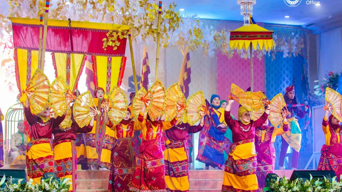In the heart of the Bangsamoro region, local dancers showcase the "Kapagapir-apir" dance using traditional colored fans and the "kakini-kini" walking style. The unique regional performance highlights the distinct Islamic and cultural heritage unique to communities surrounding Lake Lanao. Photo courtesy of BIO
