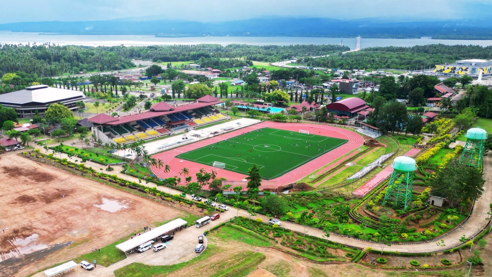 An aerial view captures the Mindanao Civic Center (MCC) Sports Complex in Tubod, Lanao del Norte, home to a FIFA-standard football pitch and World Athletics Class 2 track oval. The venue provides homegrown student-athletes from surrounding municipalities with regulation-grade training grounds for regional meets like the NMRAA and national events like the Palarong Pambansa. (Photo courtesy of Lanao del Norte Provincial Information Office)