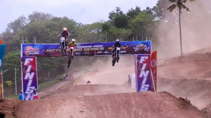 AIRBORNE FINISH. Three riders soar over a jump as they race toward the finish line during the Mindanao-wide Motocross Challenge at the Mindanao Civic Center Race Track in Tubod, Lanao del Norte. The event was held as part of the province's 67th Araw ng Lanao del Norte celebration. (Photo courtesy of ADD/PIA-10/Lanao del Norte)