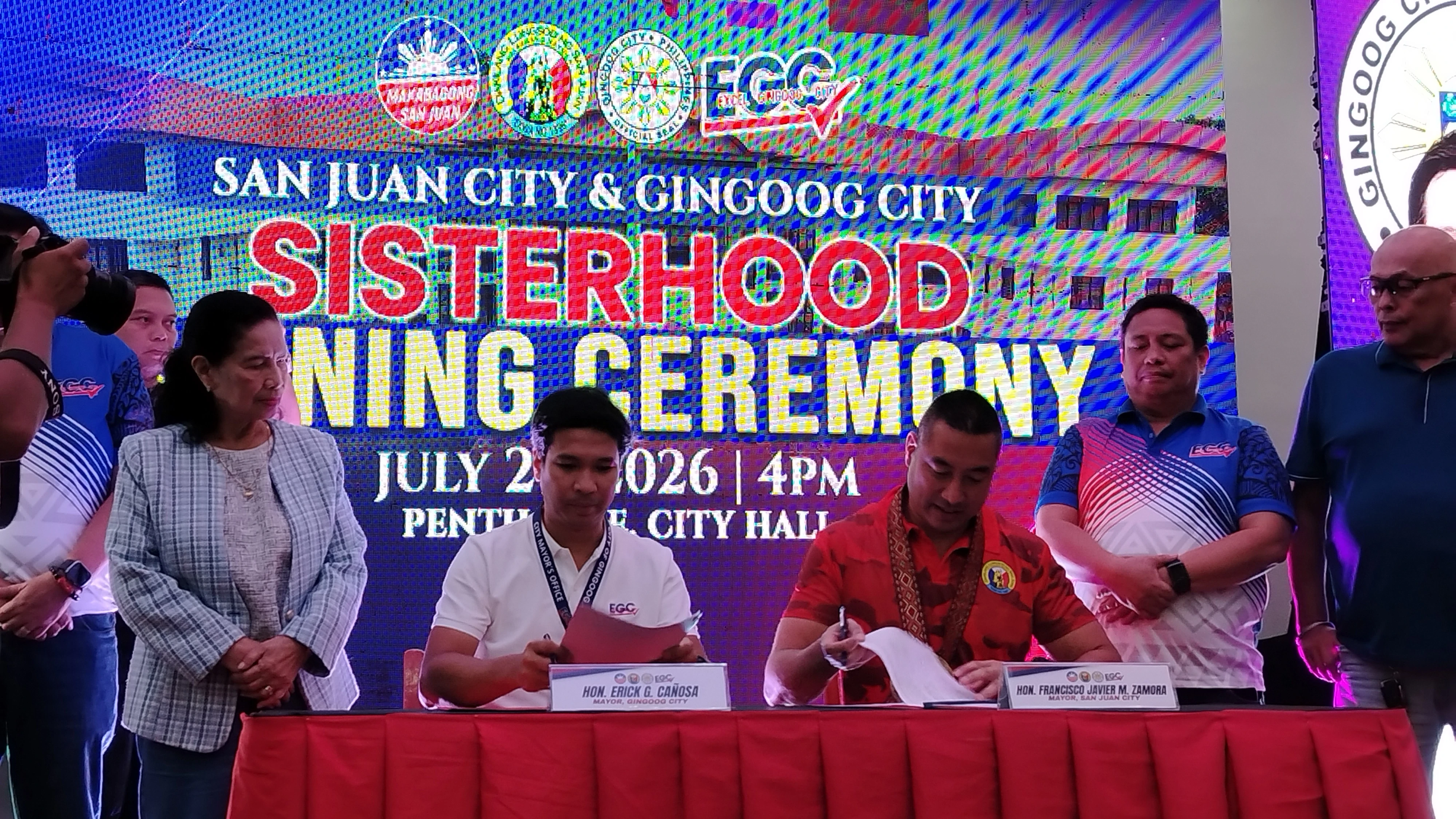 San Juan City Mayor Francisco Javier Zamora, El Salvador City Mayor Edgar Lignes, and Gingoog City Mayor Eric Cañosa sign historic sisterhood agreements on Wednesday, July 29, 2026. The inter-city partnership formalizes cooperation across trade, tourism, education, and local governance initiatives between the Metro Manila municipality and the Northern Mindanao cities. (Photo by Shiela Mae Butlig)