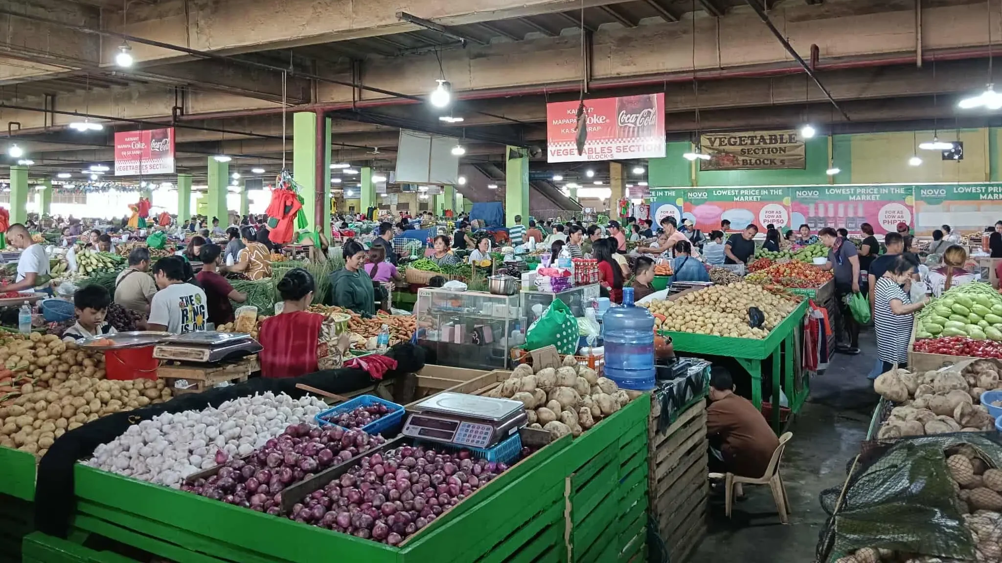 Vendors sell fresh produce inside the vegetable section of a public market in Cagayan de Oro City at Cogon public market.  (File Photo courtesy of City Economic Enterprises and Business Development Administration)