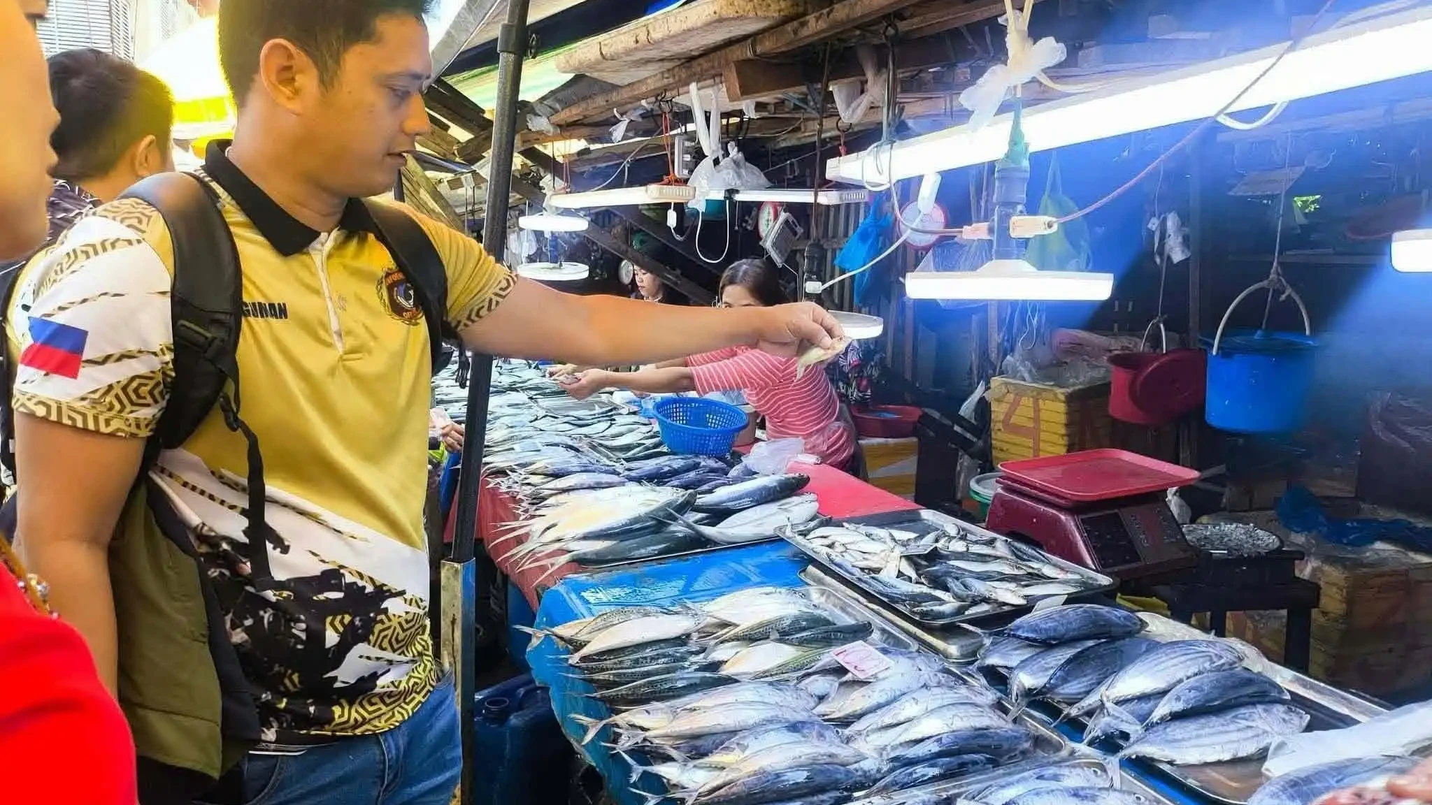 Representatives from the Agricultural Productivity Operations Office (APOO), CEEBDA, and BFAR-10 inspect fish stalls during a Market Denial Campaign at the Puerto Public Market in Cagayan de Oro City. The joint operation aimed to curb illegal fishing practices and prevent illegally caught seafood from entering public distribution channels. (File Photo courtesy of Cagayan de Oro City Information Office)