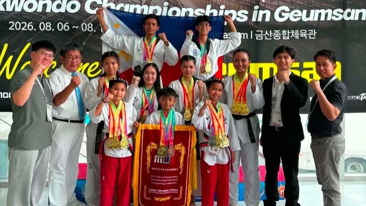Members of the Cagayan de Oro Taekwondo Main Gym delegation—led by Head Instructor Vincent Cecil M. Orcales (far right) and Team Coach Elrique Vinzo A. Orcales (second from right)—gather with four-time gold medalist Cielo Marie E. Apag (standing, second from right) and fellow medalists at Geumsan General Gymnasium in Geumsan, South Korea, following the 11th MBC International Open Taekwondo Championships held Aug. 6–10, 2026. (Photo courtesy of CDO Taekwondo Main Gym)