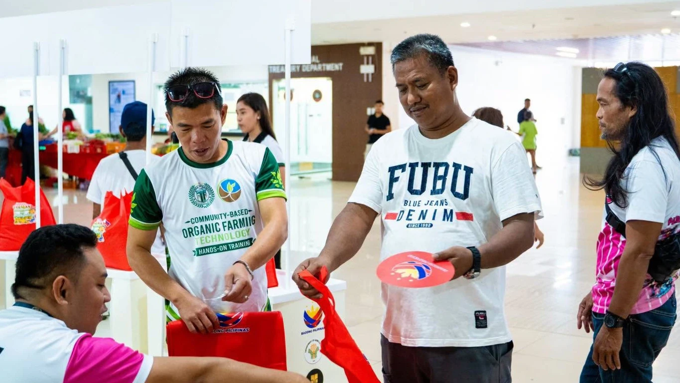 AFFORDABLE RICE. About 500 qualified Camiguin residents from various sectors buy rice at ₱20 per kilogram during the expanded Benteng Bigas Meron (BBM) Na! program at the Provincial Capitol on July 31. The subsidized rice gives families, including farmers, senior citizens, fisherfolk, transport drivers and minimum-wage earners, a chance to stretch their household budgets amid rising food costs. (Photo courtesy of LGU Camiguin)