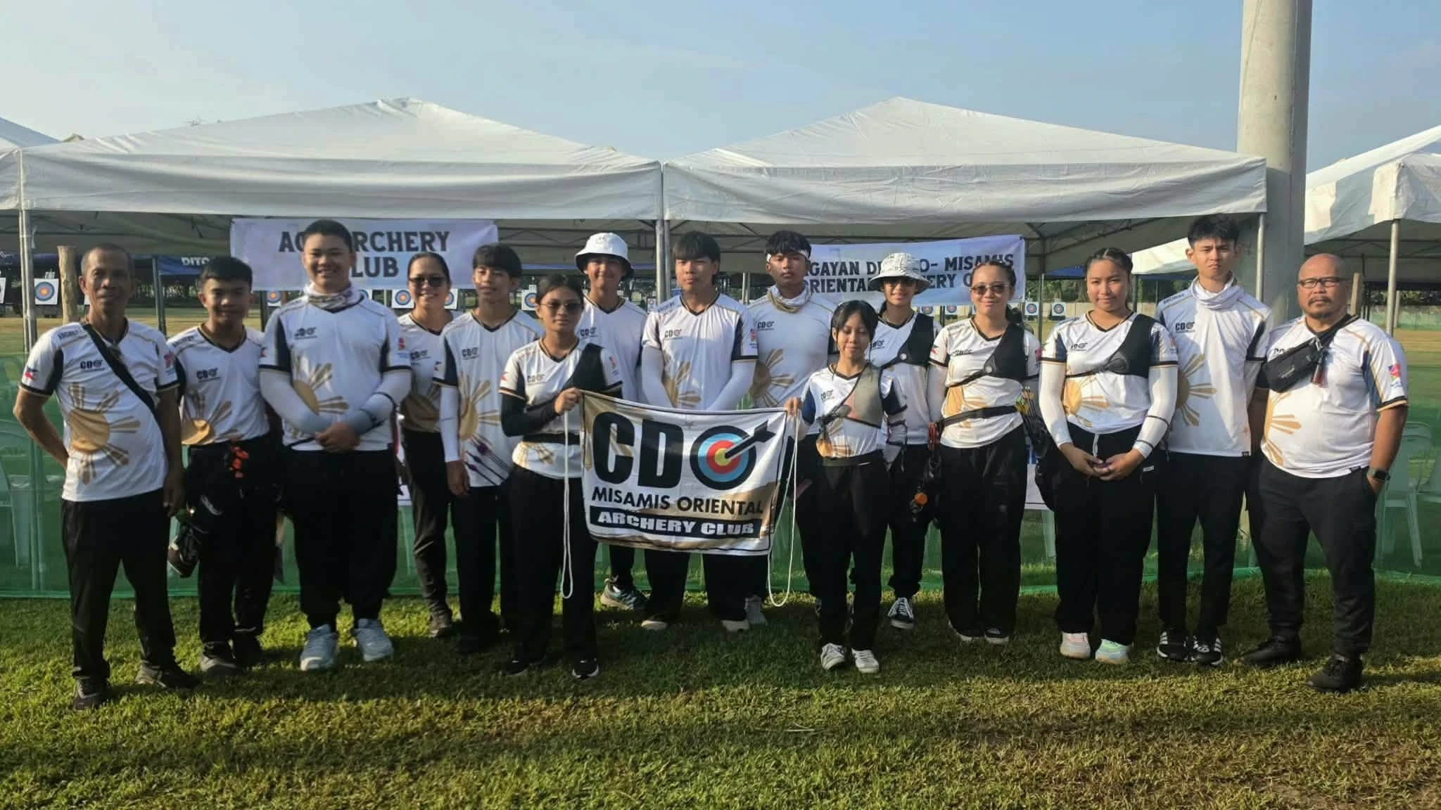 The Cagayan de Oro–Misamis Oriental Archery Club (CDO-MOAC) delegation gathers at the Tionko Football Field during the PSC–World Archery Philippines National Championship Qualifier Leg 3 in Davao City. Local archers earned 17 medals across Recurve, Barebow, U15, U17, and Open divisions. (Supplied photo)