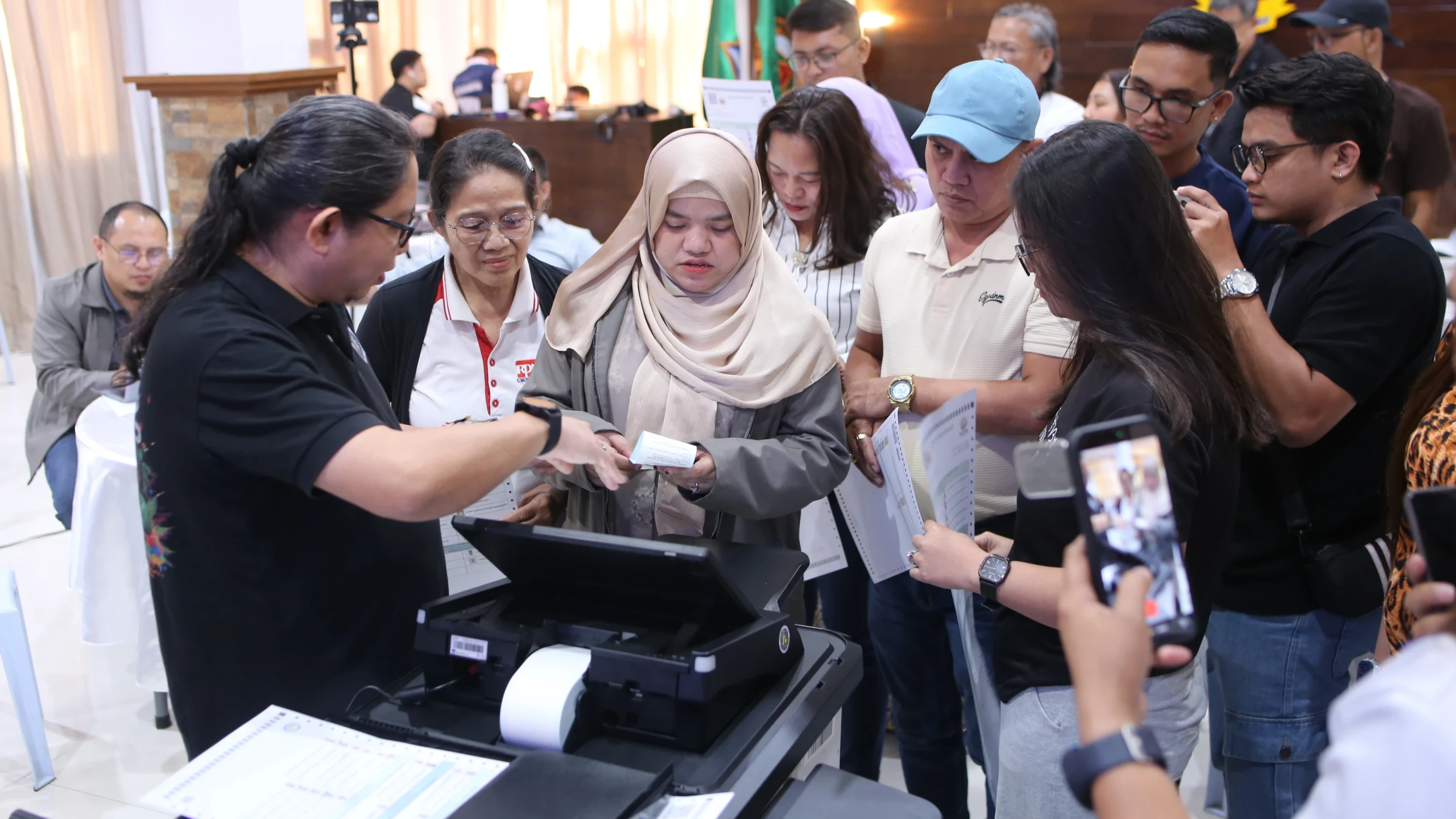 MACHINE DEMO. Comelec demonstrates the new vote-counting machines to journalists ahead of the Sept. 14 BARMM parliamentary elections. (Photo: ZRD/PIA-10)
