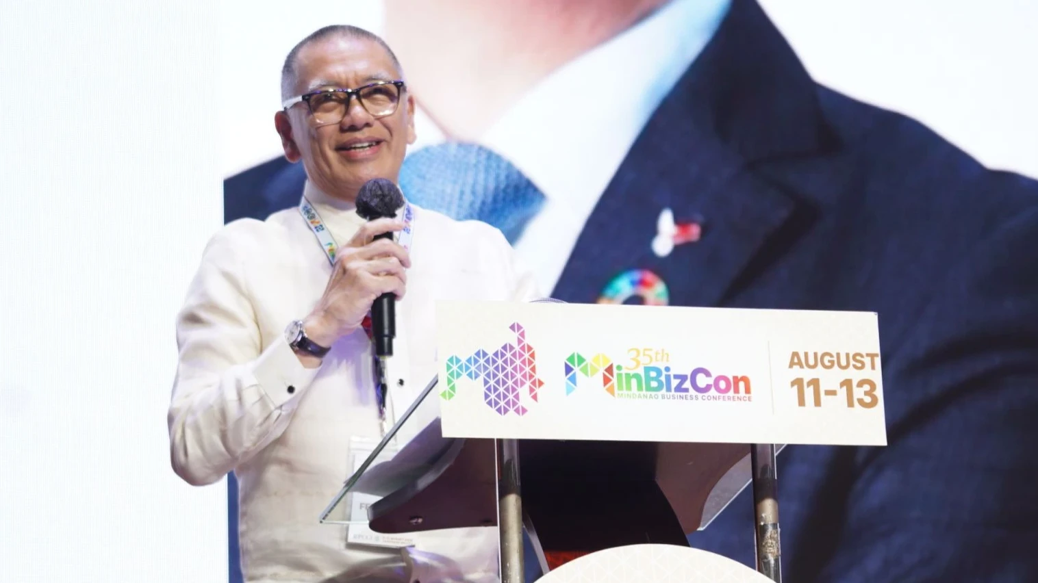 AGRI INVESTMENTS. DA-10 Regional Executive Director Jose Apollo Y. Pacamalan presents investment opportunities in farm processing, post-harvest facilities, renewable energy, and digital agriculture during the 35th Mindanao Business Conference in Cagayan de Oro City on Aug. 12, aimed at creating better markets for farmers and strengthening Mindanao’s food supply. (Photo courtesy of JAKA/PIA-10)