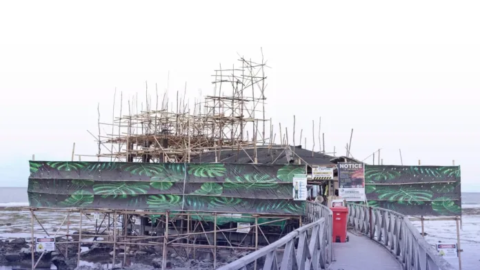Construction scaffolds line the iconic Cloud 9 boardwalk tower in General Luna, Siargao Island, during ongoing rehabilitation works on Thursday, July 31, 2026. Municipal leaders and tourism officials inspected the coastal development site to ensure facility upgrades, including new public restrooms and first-aid booths, are completed before the 2026 World Surf League Championship Tour begins on Oct. 31. (Photo courtesy of Lingkod Lapid FB)