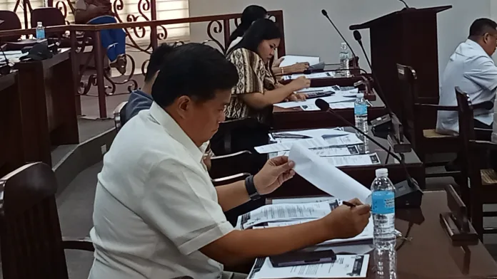 Members of the Sangguniang Panlungsod of Gingoog City review municipal legislation during their regular session on Monday, Aug. 10, 2026. The passage of the ₱12.95-million supplemental budget ensures the implementation of national salary standardization guidelines for local civil servants. (Photo by Edwin Iyo)