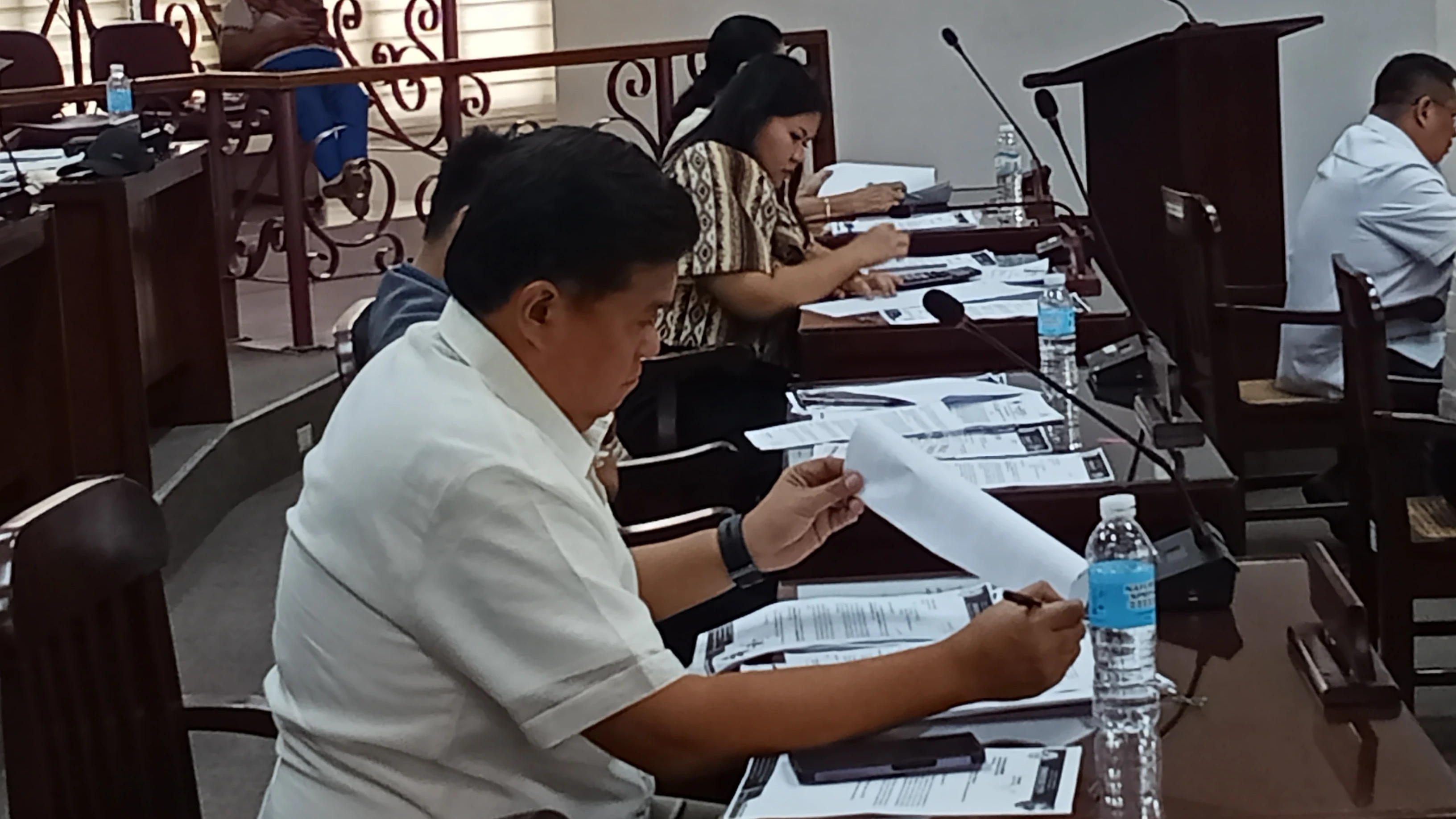 Members of the Sangguniang Panlungsod of Gingoog City review municipal legislation during their regular session on Monday, Aug. 10, 2026. The passage of the ₱12.95-million supplemental budget ensures the implementation of national salary standardization guidelines for local civil servants. (Photo by Edwin Iyo)