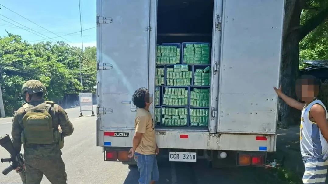 SEIZURE. Law enforcement personnel inspect 1,400 reams of suspected smuggled “Greenhills” cigarettes seized during a checkpoint operation in Barangay Dalipuga, Iligan City, on Aug. 9, 2026. The cigarettes have an estimated suggested retail price of ₱1.12 million. (Supplied photo)