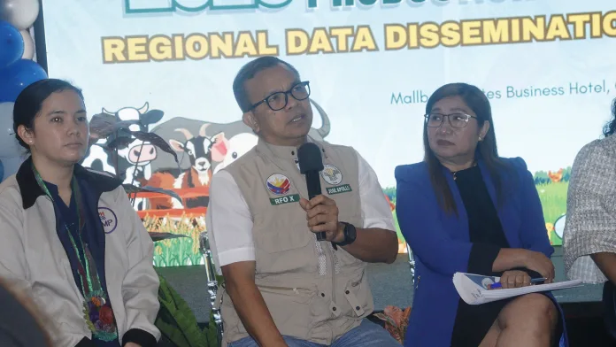 AGRICULTURAL BOOST: Department of Agriculture Region 10 (DA-10) Executive Director Jose Apollo Y. Pacamalan, center, speaks during the Regional Data Dissemination Forum at Mallberry Suites Business Hotel in Cagayan de Oro City. Seated beside him are Stephanie C. Tomarong, left, OIC of BFAR-10's Planning, Monitoring, and Evaluation Unit, and fellow panel members. (Photo courtesy of PSA 10)