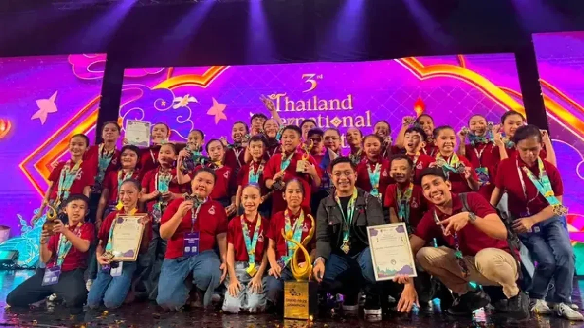 The Marbel Children’s Chorus poses with their trophies and award certificates on stage after winning the overall Grand Prix Championship at the 3rd Thailand International Choral Festival in Bangkok. Supplied Photo