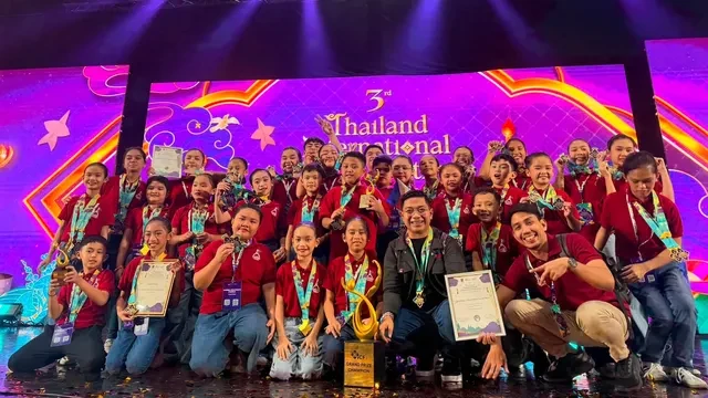The Marbel Children’s Chorus poses with their trophies and award certificates on stage after winning the overall Grand Prix Championship at the 3rd Thailand International Choral Festival in Bangkok. Supplied Photo