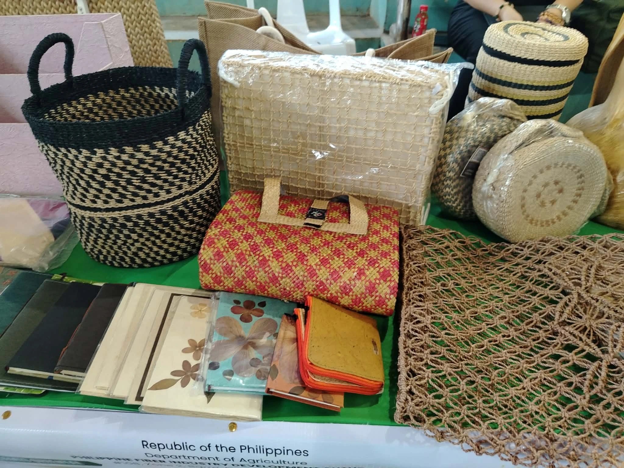 ABACA OPPORTUNITIES. Abaca bags, handicrafts and other fiber-based products are displayed during the signing of the MOA for the Tissue Culture Laboratory in Sugbongcogon, Misamis Oriental. PhilFIDA aims to boost farmers' income through disease-free planting materials and higher-value abaca products. (Photos by Shiela Mae Butlig)