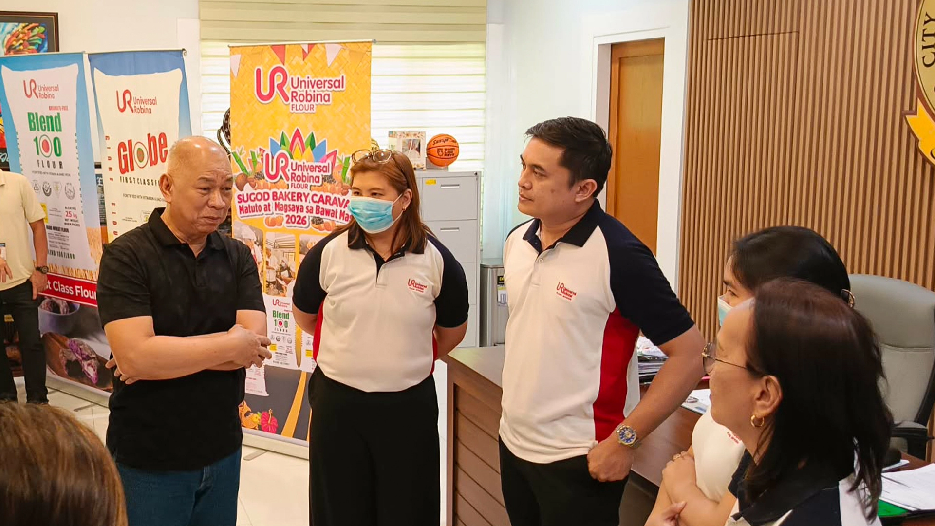 Cagayan de Oro City Mayor Rolando "Klarex" Uy (left) converses with URC Flour Commercial Director Naida Dalisay-Ebora (second from left) and company representatives during a courtesy call at City Hall in Cagayan de Oro City on Thursday, Aug. 6, 2026. The executive meeting finalized preparations for the "Sugod Bakery Caravan," a joint public-private initiative bringing free technical training and modern equipment to local bakeshops during Higalaay Festival 2026. Photo by Dave Achondo