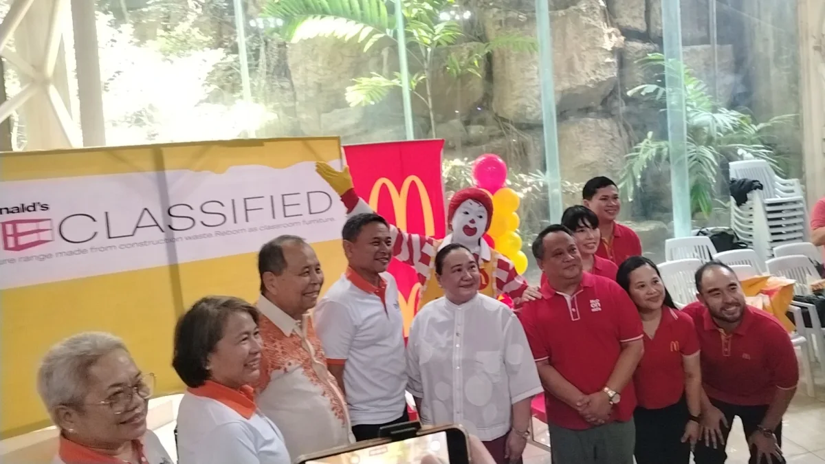 RECYCLED CHAIRS FOR LEARNERS. Education Secretary Sonny Angara joins McDonald’s representatives during the turnover of chairs made from recycled materials for learners at the National Teachers’ Month celebration at Limketkai Atrium in Cagayan de Oro City on September 5. The initiative supports schools while promoting sustainability. (Photo by Shiela Mae Butlig)