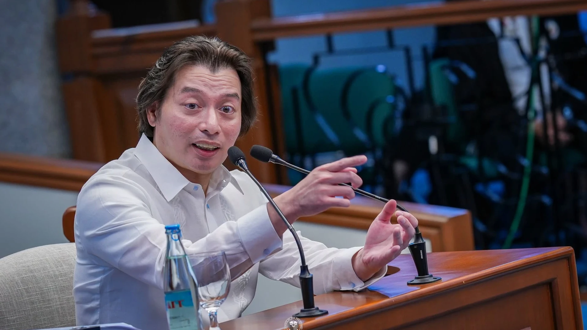 ormer DepEd Chief of Staff Atty. Michael Poa addresses Senator-Judges during the impeachment trial of Vice President Sara Duterte. Poa testified on the compartmentalized "need-to-know" system surrounding DepEd's ₱112.5-million confidential funds and single-day cash withdrawals under scrutiny by state auditors and lawmakers. (Photo courtesy of Senate of the Philippines)