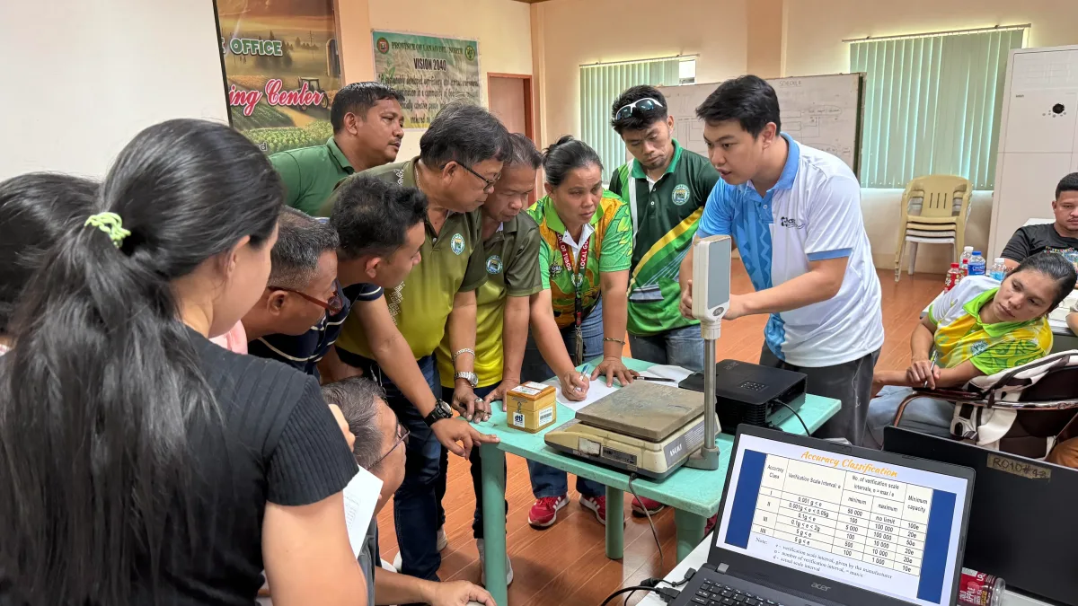 CHECKING FUEL PUMPS. DOST-NorMin metrology personnel and LGU trainees verify a fuel dispensing pump at a gasoline station in Lanao del Norte as part of the three-day training on accurate measurements.