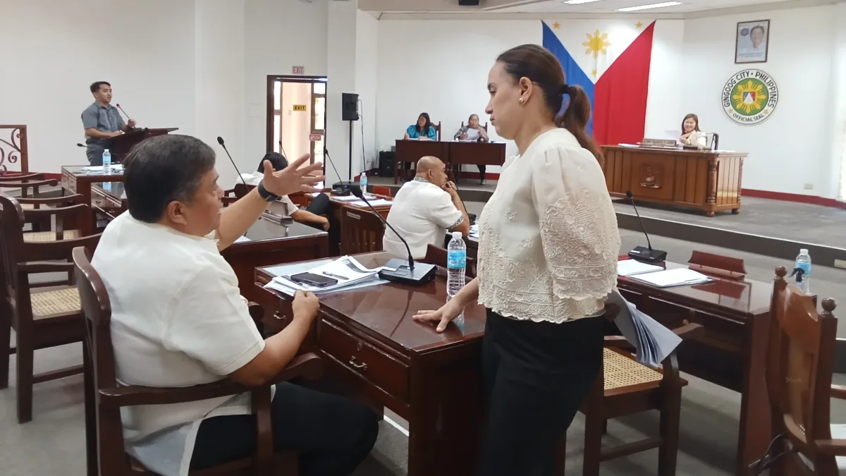Gingoog City councilors discussing master plan proposals for the Civoleg government hub during session.