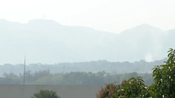 REDUCED VISIBILITY: A thick layer of atmospheric haze obscures the mountain range in Cagayan de Oro. Mayor Erick G. Cañosa issued a public health warning advising residents to limit outdoor activity, wear face masks, and keep doors and windows closed as fine particulate matter affects regional air quality. (Photo screengrabbed from GMA Regional)