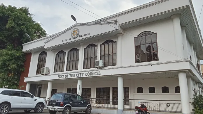 Gingoog City Sangguniang Panlungsod committee members and BIR RDO 97 officials discuss the proposed 2,000-square-meter land donation for a BIR training center at the SP Session Hall.