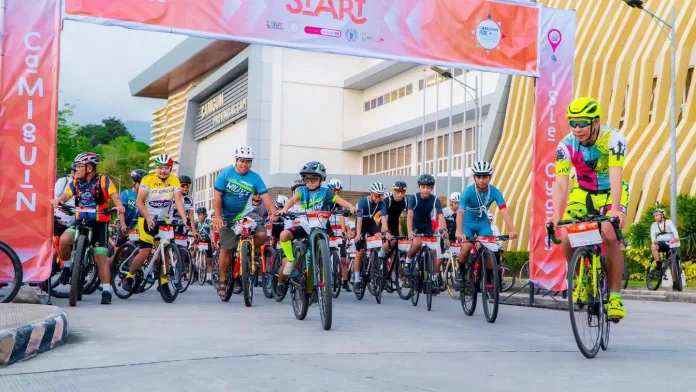 177 cyclists participate in the Isle Cycle Island Bike Fun Tour along the coastal circumferential highway in Camiguin Island. Tourism Officers Floren Mae Tarnate and Rojhen Yven Pantallano, alongside DOT-10, hosted the 64-kilometer ride passing through Tongatok Cliff, the Old Church Ruins, Sagay, Guinsiliban, and Mahinog for the 47th Lanzones Festival preview. (Photo courtesy of Camiguin Provincial Tourism)