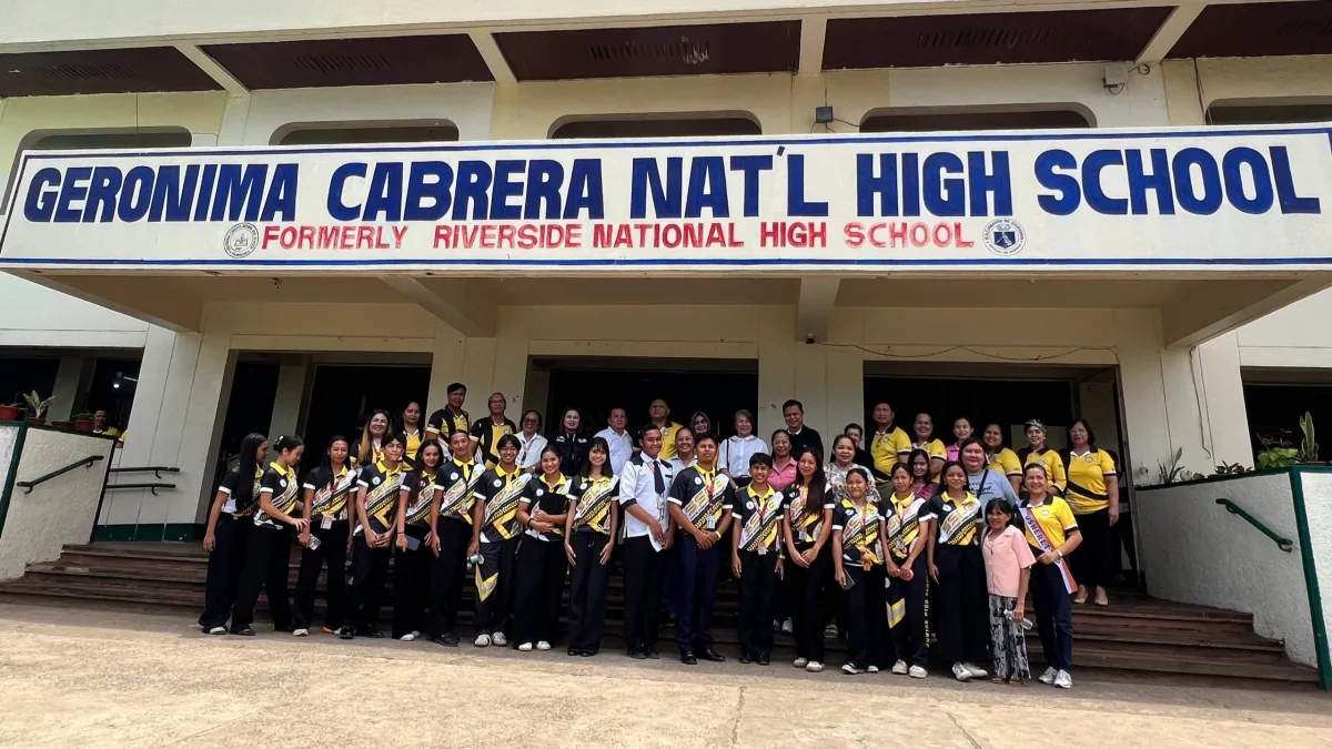 Grade 12 students from Kolambugan attending LGU work immersion during a municipal flag ceremony.