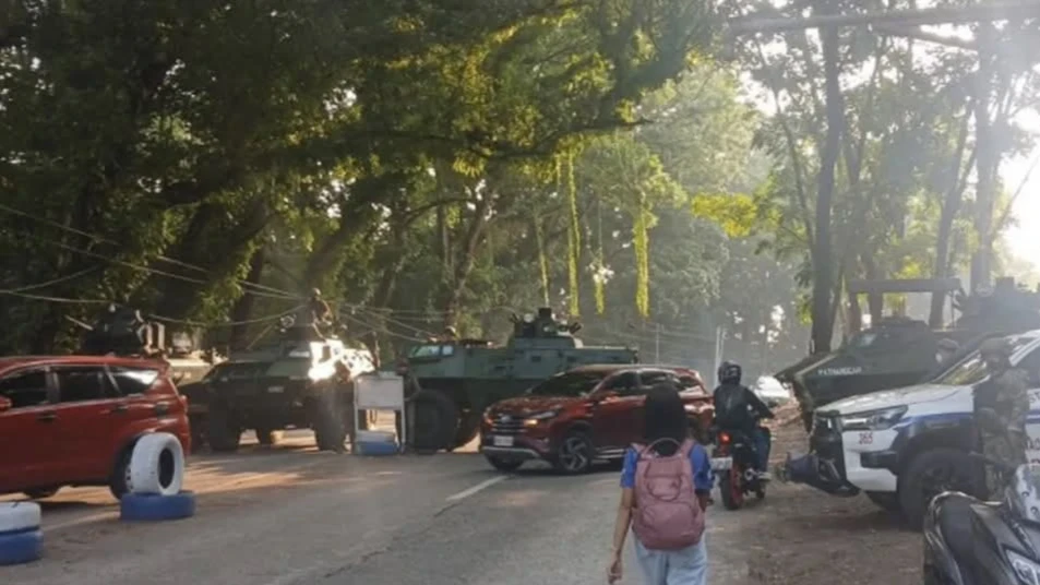 JOINT CHECKPOINT. Philippine Army and police personnel intercept and engage in dialogue with a group of MILF members during a checkpoint operation in Lanao del Norte ahead of the 2026 BARMM Parliamentary Elections. (Photo courtesy of 2Mech Magbalantay Brigade)