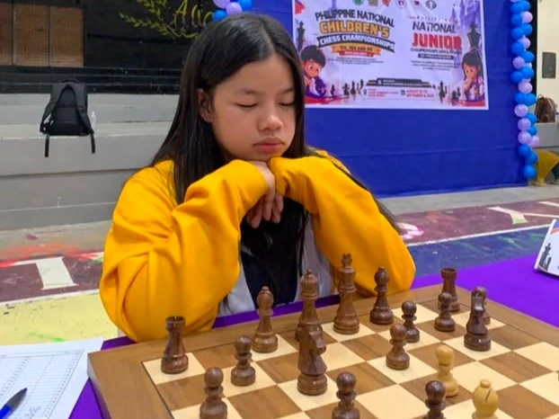 Cagayan de Oro chess prodigy WIM Ruelle Canino ponders a move during the Philippine National Women’s Invitational Chess Championship in Alicia, Isabela. Organized with the National Chess Federation of the Philippines and the Philippine Sports Commission, the tournament serves as a qualifier and tune-up for the World Chess Olympiad. (Photo courtesy of National Chess Federation of the Philippines)