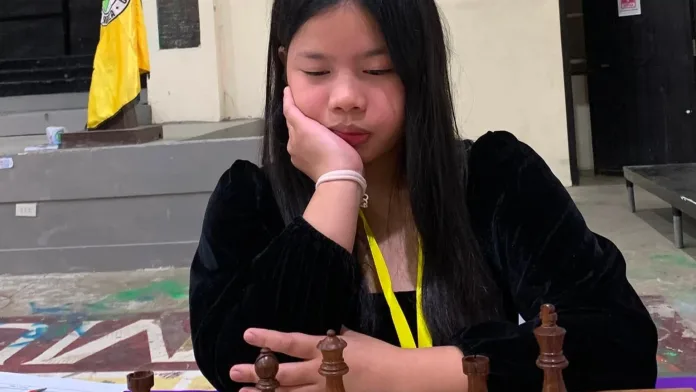 Cagayan de Oro chess standout WIM Ruelle “Taweng” Canino focuses on her match during the 2026 Philippine National Women’s Invitational Chess Championship in Alicia, Isabela. The Far Eastern University athlete placed third overall with 8 points before heading to the World Chess Olympiad in Uzbekistan. (Photo courtesy of National Chess Federation of the Philippines)