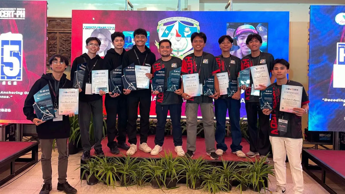 Members of Saint Michael College of Caraga's two competition teams pose with their awards during the HackforGov 2026 Capture-the-Flag Regional Qualifying Round at Almont Inland Resort in Butuan City on Sept. 2, 2026. SMCC swept the regional competition, with Team Michaelinian Tech Knights securing the championship and Team Un!N$P3CT3d finishing as first runner-up to advance to the national finals. (Photo Courtesy of SMCC)