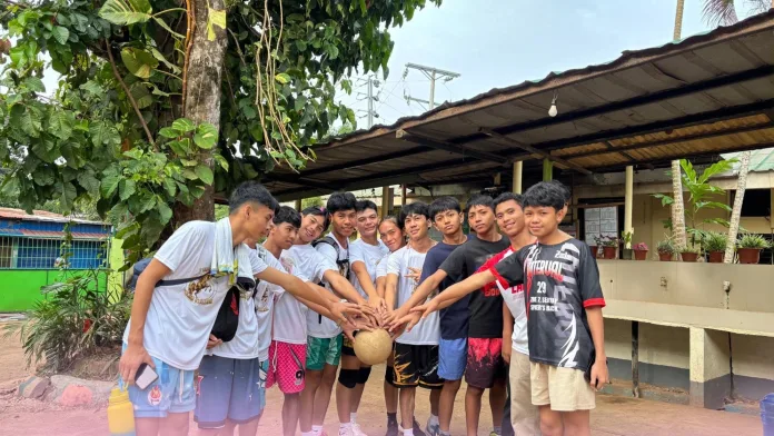 Taglimao National High School athletes compete at the Southwest 1 District Meet 2026 hosted at Tumpagon National High School, Cagayan de Oro City. Guided by coaches Eduardo Calingao and Razel Abella, the school captured four gold medals and 13 total podium finishes in athletics, badminton, esports, and volleyball. (Photo courtesy of Taglimao NHS)