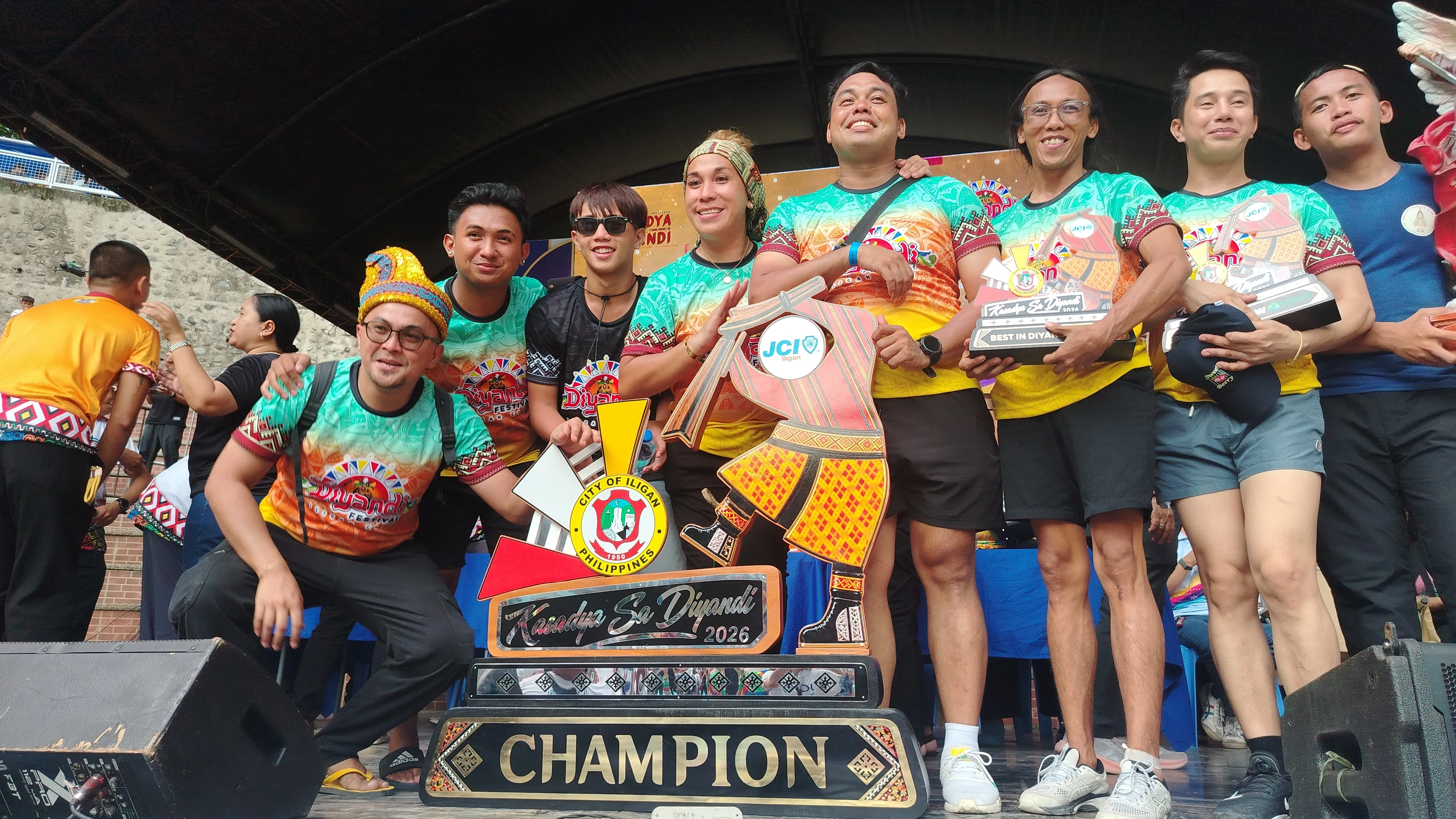 Members of Tribu Tomas Cabili celebrate on stage with their championship trophy during the Kasadya sa Diyandi 2026 awarding ceremony in Iligan City on Sunday, Sept. 27, 2026. The Barangay Tomas Cabili contingent won the overall title, a ₱1 million cash prize, and multiple minor awards after competing against five other groups. Photo by Bonita Ermac