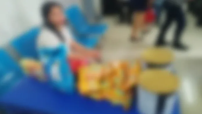 GROCERY ARREST. A 32-year-old woman was turned over to Valencia City police after she was allegedly caught carrying P11,911.75 worth of unpaid grocery items at New Gaisano City Valencia on Sept. 19. Photo Courtesy of Bukidnon PPO