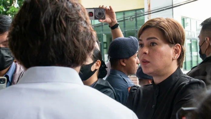 Vice President Sara Duterte addresses the media regarding criminal charges and procedural immunity. Duterte posted ₱360,000 bail in Quezon City for three counts of grave threats while her defense invokes Supreme Court precedent on limited procedural immunity for impeachable officials. (Photo courtesy of Office of the Vice President)
