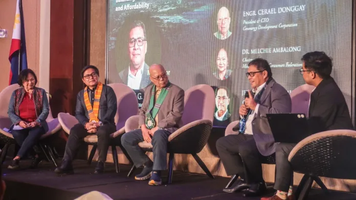 Panelists participate in a stage discussion on the Agus-Pulangi hydropower rehabilitation project during Plenary Session 2 of the 4th Mindanao Clean Energy Forum in General Santos City.