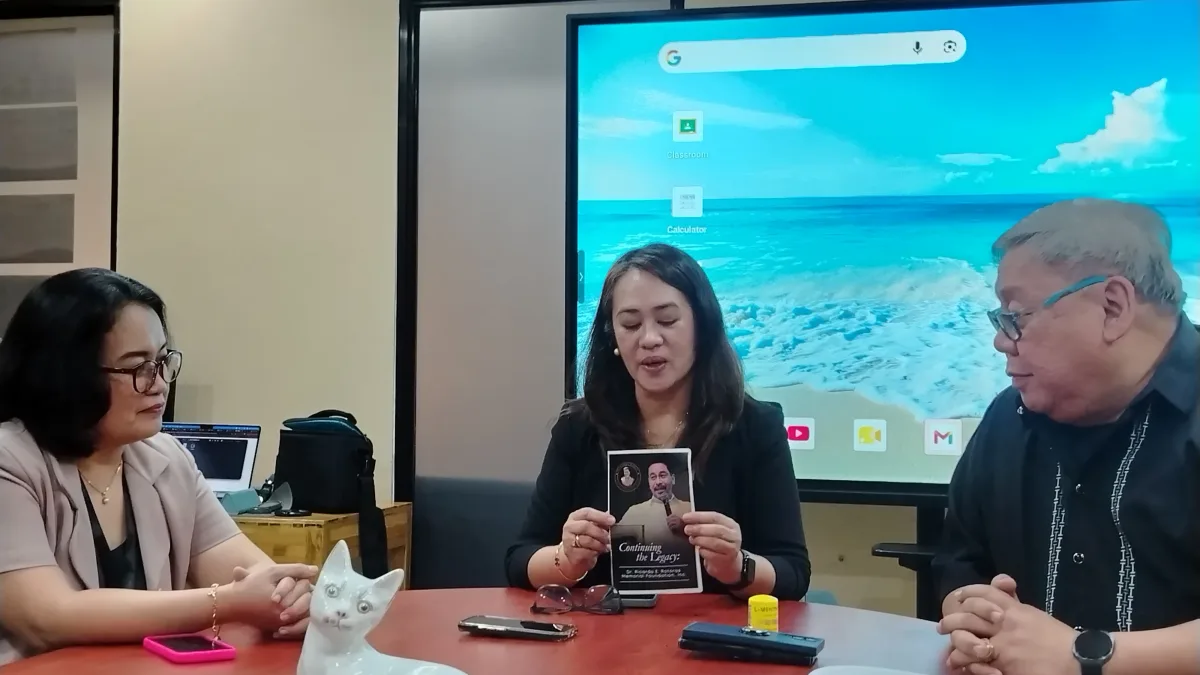 Board members and leaders of the Dr. Ricardo E. Rotoras Memorial Foundation present a promotional brochure and commemorative materials during a briefing in honor of the late USTP president.