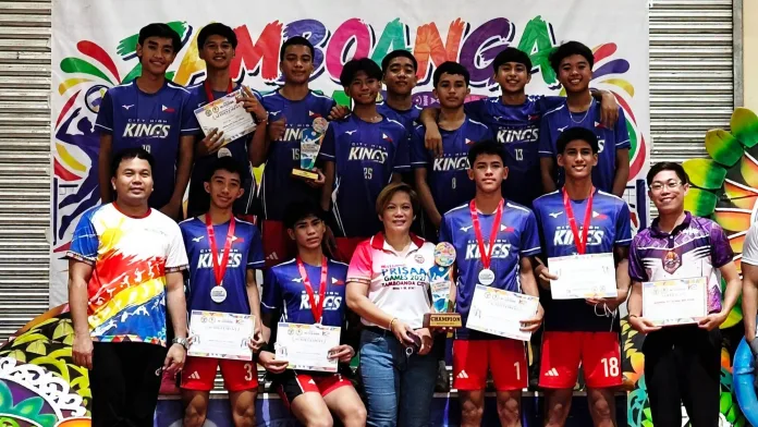 Members and coaches of the Kidapawan City National High School City High Kings pose with their championship trophy, medals, and individual award certificates during the Zamboanga Hermosa Volleyball Tournament 2026.