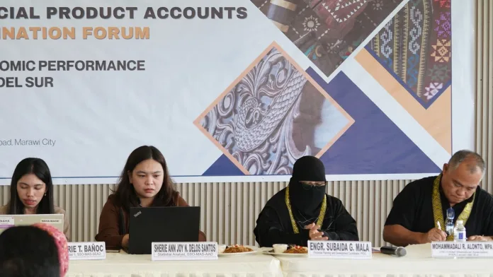 Philippine Statistics Authority officials and local planners, including Engr. Subaida G. Mala and Mohamadali R. Alonto, sit at the head table during the 2025 Provincial Product Accounts Data Dissemination Forum in Marawi City.