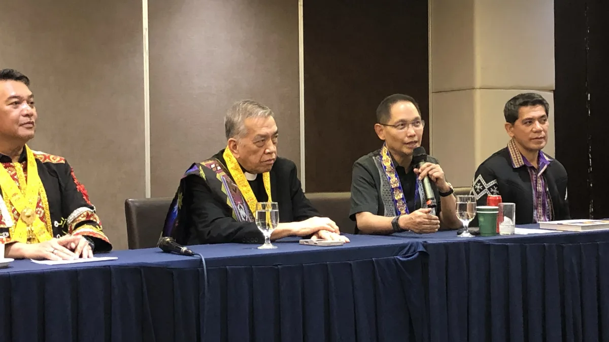 TESDA Director General Secretary Kiko Benitez speaks at a press panel table alongside MinTVET officials during a news conference in Cagayan de Oro City.